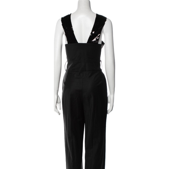 NEW NW STUNNING CAROLINA RITZLER
Crossover Sequin Belted Jumpsuit - Picture 4 of 4
